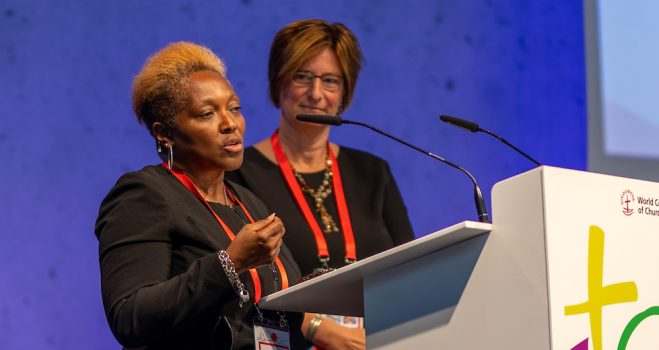 1 September 2022, Karslruhe, Germany: Moderator Rev. Karin Van Den Broeke (Protestant Church in the Netherlands) and rapporteur Rev. Dr. Karen Georgia Thompson (United Church of Christ) speaks during a business plenary session at the 11th Assembly of the World Council of Churches, held in Karlsruhe, Germany from 31 August to 8 September, under the theme "Christ's Love Moves the World to Reconciliation and Unity."